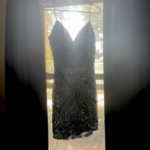 Homecoming dress, never worn, size 13, black and silver.